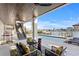 Comfortable outdoor seating with a waterfront view at 831 Bay Point Dr, Madeira Beach, FL 33708