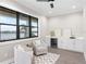 Sitting area with water view, beverage center, and modern decor at 831 Bay Point Dr, Madeira Beach, FL 33708