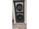Stackable LG washer and dryer in a convenient laundry closet at 5053 N Beach Rd # 9, Englewood, FL 34223