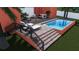 Modern pool design with steps and surrounding patio area at 429 Flamingo Dr, Apollo Beach, FL 33572