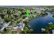 Aerial view showing home's waterfront location and surrounding neighborhood at 429 Flamingo Dr, Apollo Beach, FL 33572