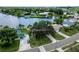 Wide aerial view of house, street, and waterway at 429 Flamingo Dr, Apollo Beach, FL 33572