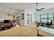 Home office with built-in desk, water views, and plenty of natural light at 429 Flamingo Dr, Apollo Beach, FL 33572