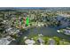 High-angle view of a house situated on a canal in a residential neighborhood at 429 Flamingo Dr, Apollo Beach, FL 33572