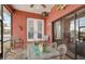 Relaxing screened porch with glass-top table and seating at 429 Flamingo Dr, Apollo Beach, FL 33572
