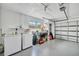 Attached garage with washer, dryer, and workbench at 429 Flamingo Dr, Apollo Beach, FL 33572
