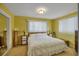 Bright bedroom with king-size bed and ample closet space at 429 Flamingo Dr, Apollo Beach, FL 33572