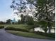 Picturesque gazebo by the water with walking path; perfect for relaxing or strolling at 228 Star Shell Dr, Apollo Beach, FL 33572