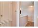 Hallway with a closet and thermostat at 228 Star Shell Dr, Apollo Beach, FL 33572