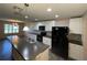 Modern kitchen featuring stainless steel appliances, sleek countertops, and ample storage at 228 Star Shell Dr, Apollo Beach, FL 33572