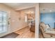 Bright living room area with updated lighting and modern decor next to entry door at 228 Star Shell Dr, Apollo Beach, FL 33572
