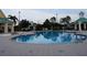 Large community pool with lounge seating and gazebo; great for recreation and relaxation at 228 Star Shell Dr, Apollo Beach, FL 33572