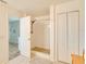 Bathroom shower with tiled floor and walls, and a view of the main bathroom at 228 Star Shell Dr, Apollo Beach, FL 33572