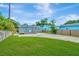 Large backyard with grassy area and a spacious deck at 2866 15Th N Ave, St Petersburg, FL 33713