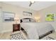 Main bedroom with gray bedding and two nightstands at 2866 15Th N Ave, St Petersburg, FL 33713