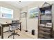 Home office with a desk, chair, and ample storage at 2866 15Th N Ave, St Petersburg, FL 33713