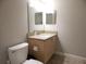 Bathroom with vanity, toilet and mirror at 5306 Santa Rosa Ct # 342, Tampa, FL 33609