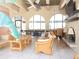 Community room with wicker furniture and fireplace at 5306 Santa Rosa Ct # 342, Tampa, FL 33609