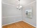 Bright dining room with hardwood floors and a chandelier at 5306 Santa Rosa Ct # 342, Tampa, FL 33609