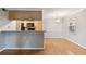 Kitchen features a breakfast bar and wood flooring at 5306 Santa Rosa Ct # 342, Tampa, FL 33609