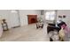 Living room with fireplace and tiled floors at 17130 Pasco Acres Dr, Spring Hill, FL 34610
