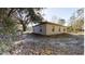 Single-story house exterior with light-colored walls at 17130 Pasco Acres Dr, Spring Hill, FL 34610