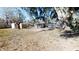Large backyard with mature trees and shed at 17130 Pasco Acres Dr, Spring Hill, FL 34610