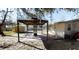 Covered patio with a pergola and pavers at 17130 Pasco Acres Dr, Spring Hill, FL 34610