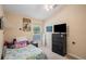 Bedroom with full-size bed and dresser at 11140 Oyster Bay Cir, New Port Richey, FL 34654