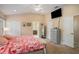 Main bedroom with king-size bed and en-suite bathroom at 11140 Oyster Bay Cir, New Port Richey, FL 34654