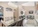 Bright dining room with seating for six, located near the kitchen at 11140 Oyster Bay Cir, New Port Richey, FL 34654