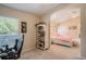 Main bedroom with sitting area and access to bathroom at 11140 Oyster Bay Cir, New Port Richey, FL 34654