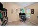 Home office with built-in shelving, computer desk and gaming chair at 11140 Oyster Bay Cir, New Port Richey, FL 34654