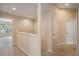 Upstairs hallway with access to bedrooms and bathroom at 11140 Oyster Bay Cir, New Port Richey, FL 34654
