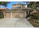 Two story home with three car garage and landscaping at 11140 Oyster Bay Cir, New Port Richey, FL 34654