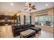 Open kitchen with stainless steel appliances and breakfast bar at 11140 Oyster Bay Cir, New Port Richey, FL 34654