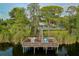 Relaxing community dock with seating area overlooking the lake at 11140 Oyster Bay Cir, New Port Richey, FL 34654