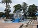Community spray park with a mushroom-shaped water feature at 11140 Oyster Bay Cir, New Port Richey, FL 34654