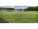 Golf course view with lake and lush green fairways at 6120 Cezanne Ave, Lutz, FL 33558