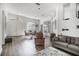 Bright and spacious living room with hardwood floors at 6120 Cezanne Ave, Lutz, FL 33558