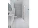 Clean bathroom with walk-in shower and modern vanity at 6120 Cezanne Ave, Lutz, FL 33558