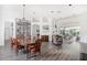 Elegant dining room featuring hardwood floors and a chandelier at 6120 Cezanne Ave, Lutz, FL 33558