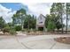 Community clubhouse with landscaping at 6120 Cezanne Ave, Lutz, FL 33558