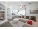 Comfortable living room with hardwood floors and built-in shelving at 6120 Cezanne Ave, Lutz, FL 33558