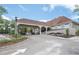 Golf clubhouse with covered entrance at 6120 Cezanne Ave, Lutz, FL 33558