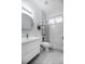Clean bathroom, featuring a shower/tub combo, toilet, and vanity at 6120 Cezanne Ave, Lutz, FL 33558