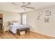 Spacious bedroom with hardwood floors and walk-in closet at 228 Star Shell Dr, Apollo Beach, FL 33572