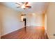 Bright and airy living room with hardwood floors and access to balcony at 4221 W Spruce St # 1310, Tampa, FL 33607