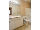 Clean bathroom with a vanity, toilet, and bathtub at 4221 W Spruce St # 1310, Tampa, FL 33607