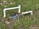 Well pump and pipes in grassy area at 6297 Harcross Ct, Spring Hill, FL 34606